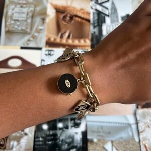 GOLD & BLACK ANNE KLEIN PEEKABOO WATCH